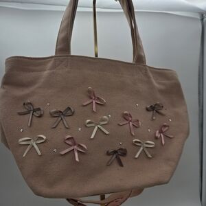 Tocca Bow-Embellished Pink Crossbody Handbag